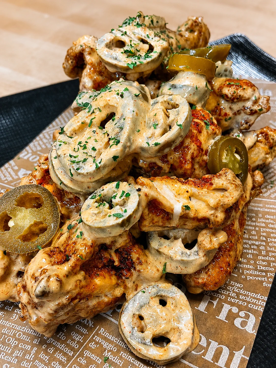 Creamy onion chicken with jalapeño garnish