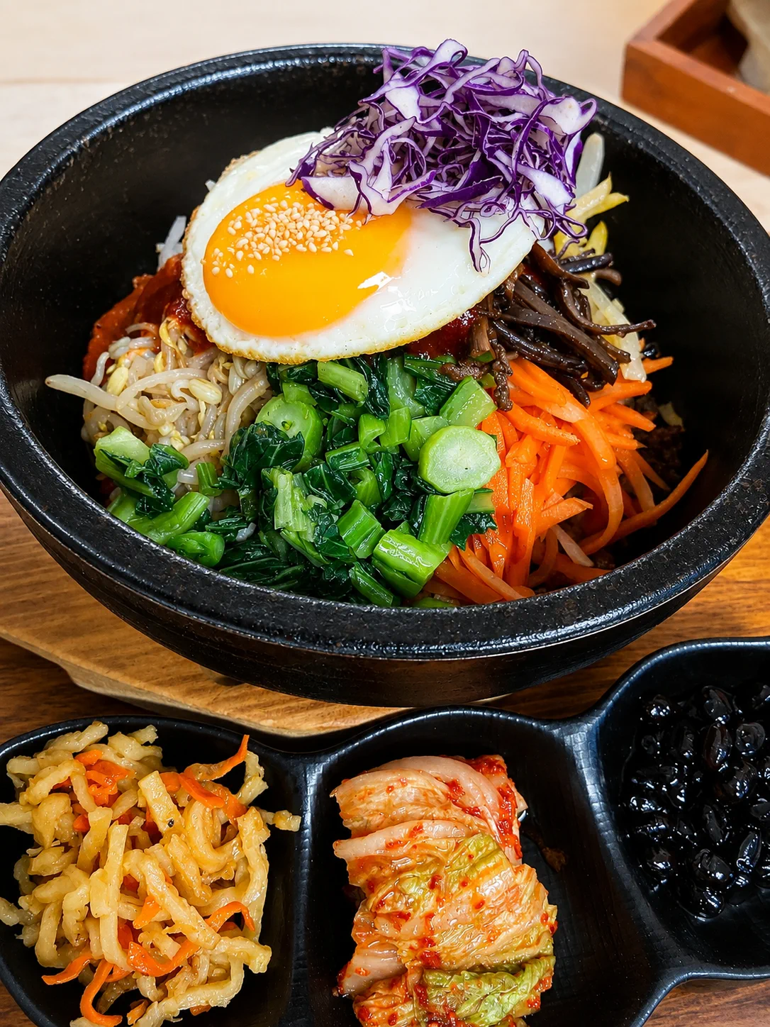 Bibimbap with vegetables, egg and Korean chilli sauce